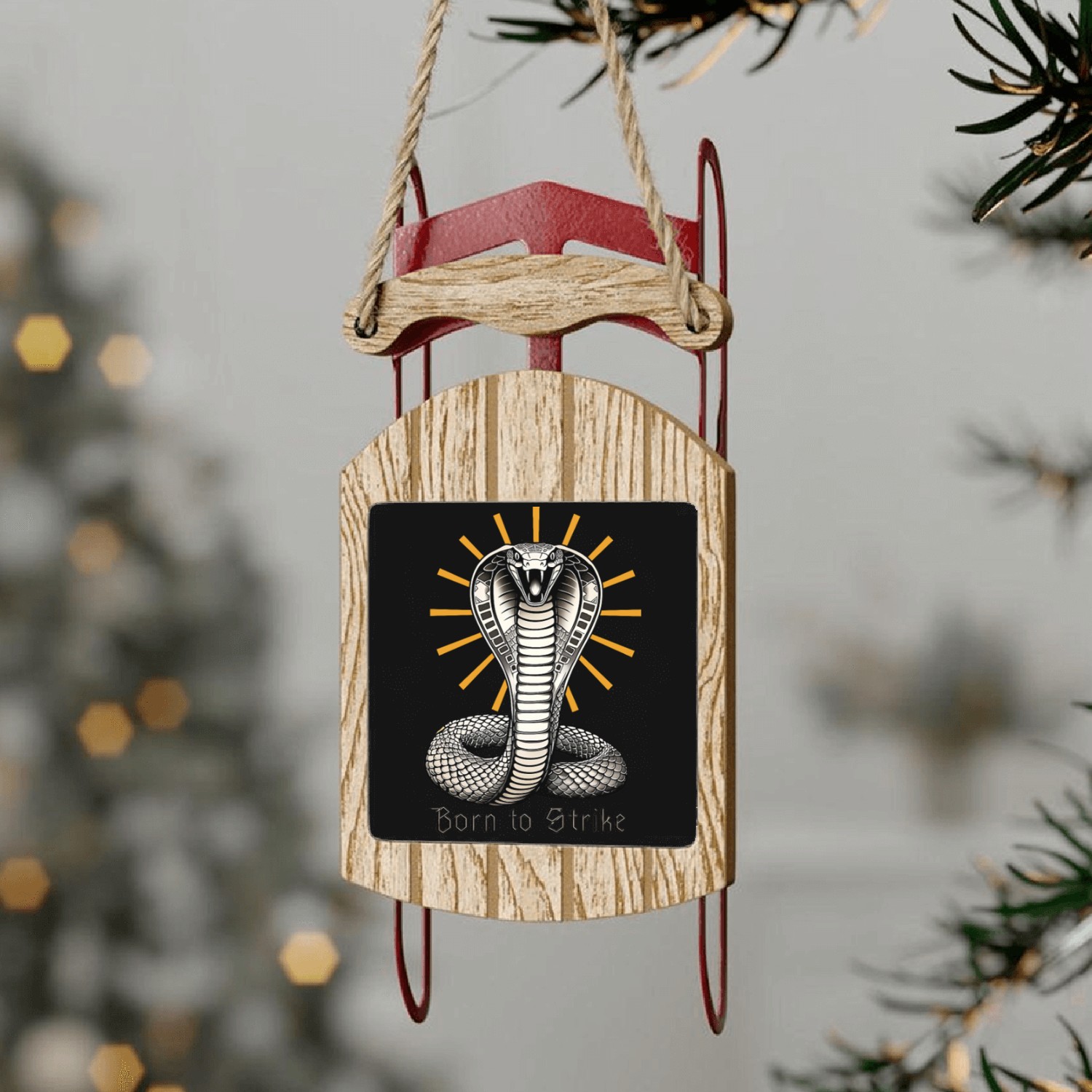 a rearing cobra drawn in ancient Egyptian tattoo Sled Ornaments