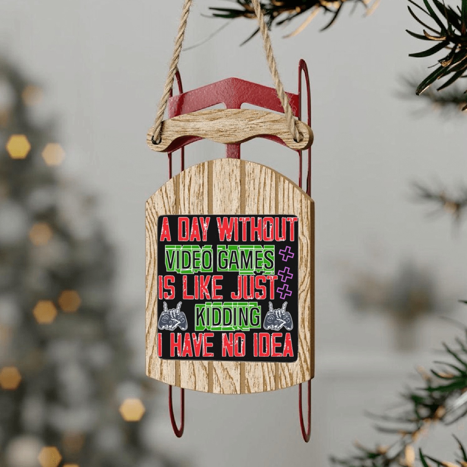 A Day Without Video Games Is Like Just Kidding Sled Ornaments